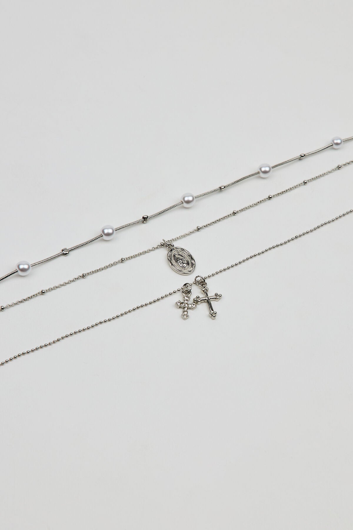 Set of 3 Pearl, Cross, and Pendant Necklaces Gray Garage Clothing Women